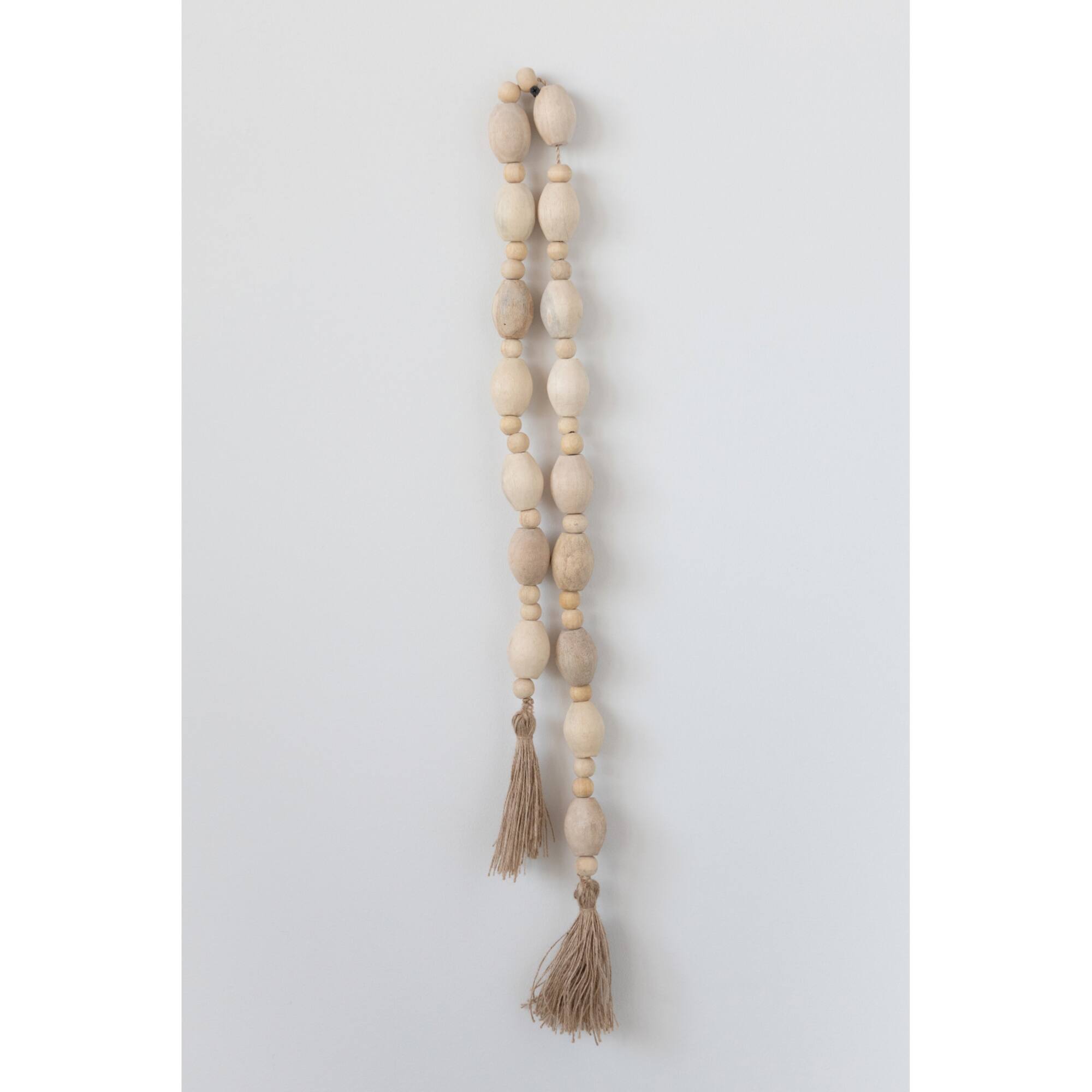 Hello Honey® 60" Mango Wood Bead Garland with Jute Tassels
